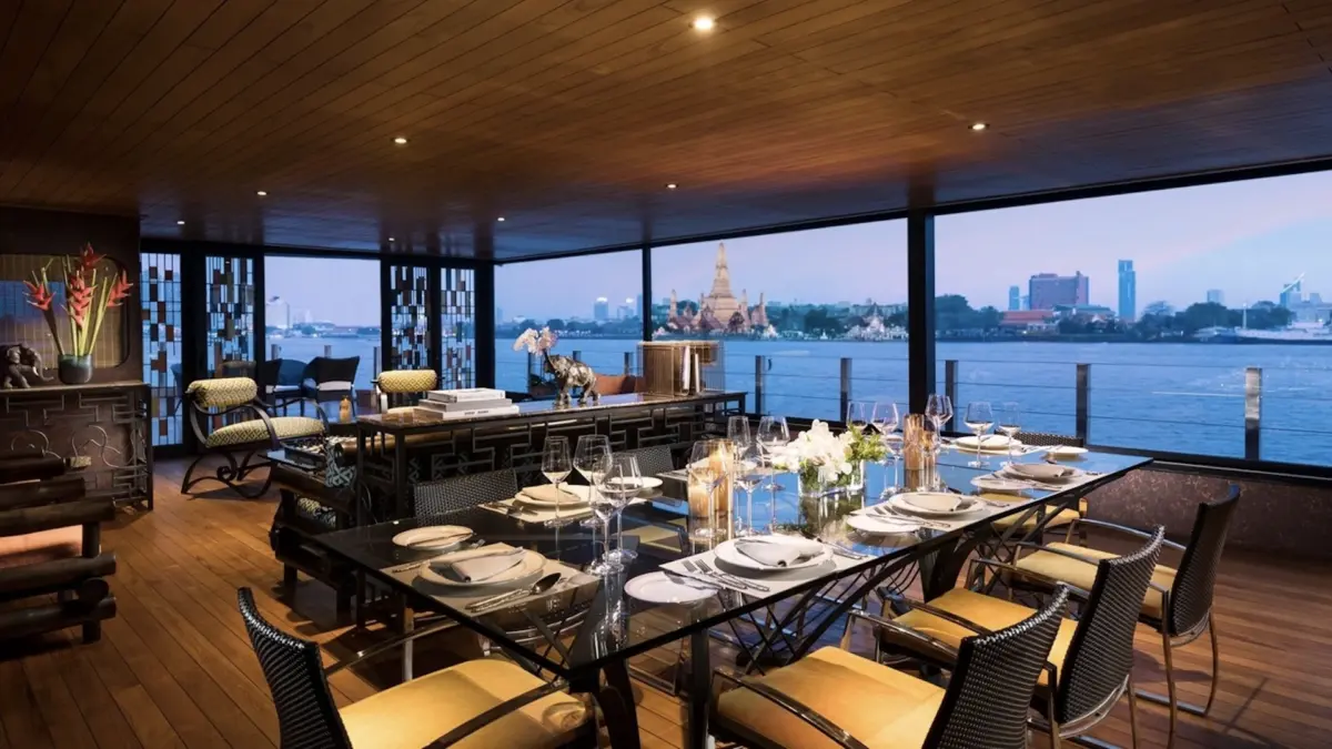 loy pela voyages luxury dinning room view river temple bangkok.webp.webp