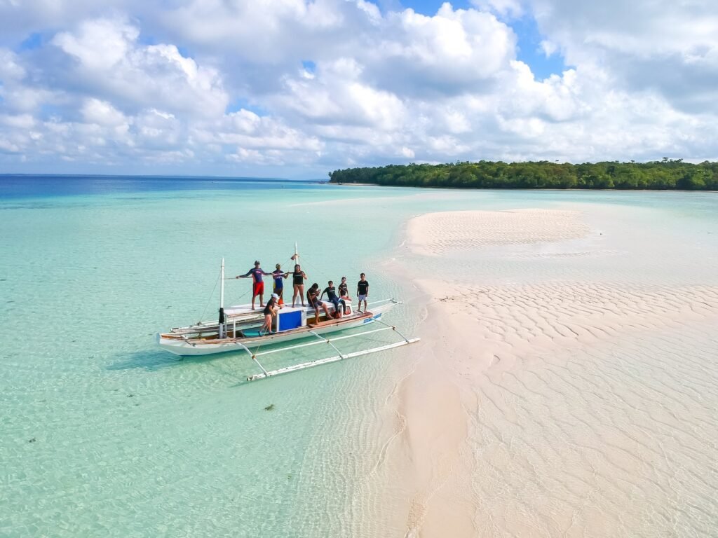 people riding on boat during daytime