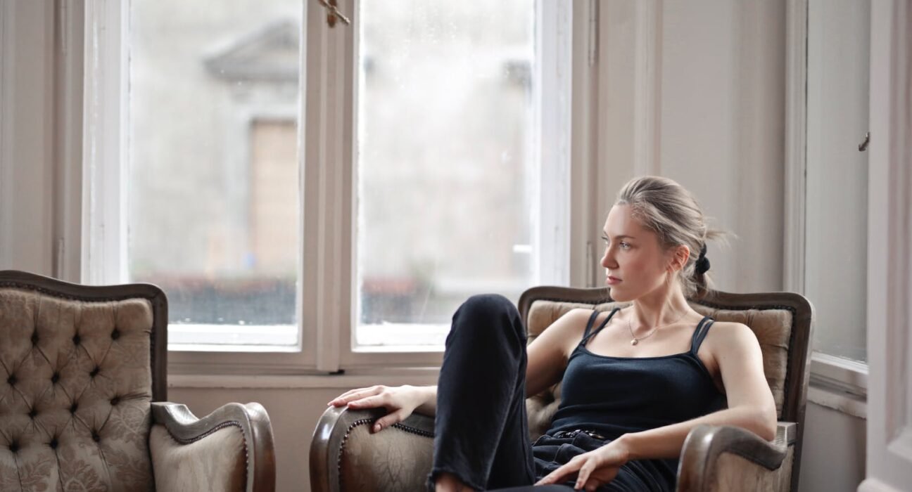 Woman Sitting on Chair