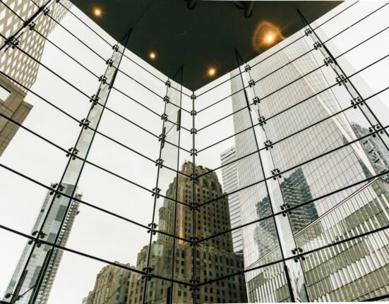 gray high-rise building at night time