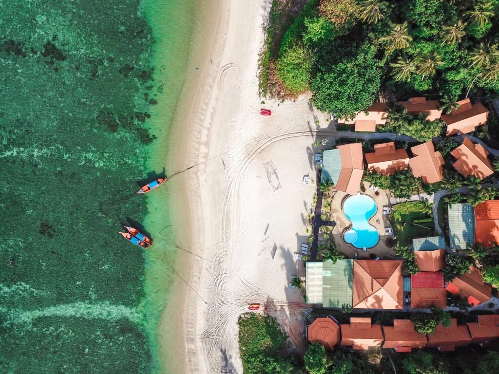 aerial view of resort near beach
