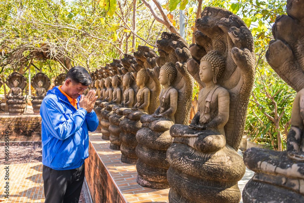 kalasin, thailand, february 1, 2023. buddhist men pay respect to ...