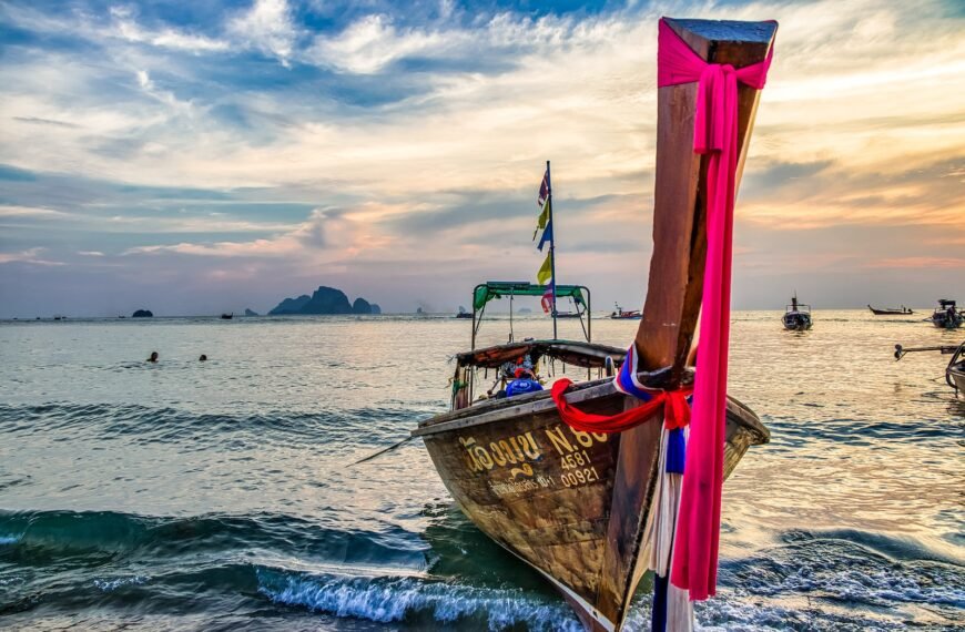 brown boat on sea during daytime