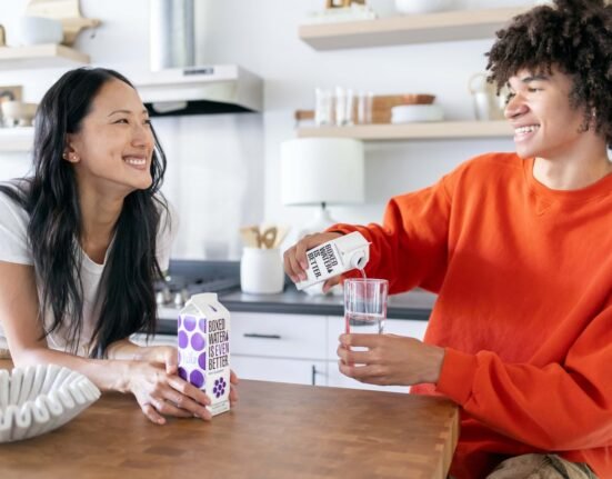 a woman sitting at a table