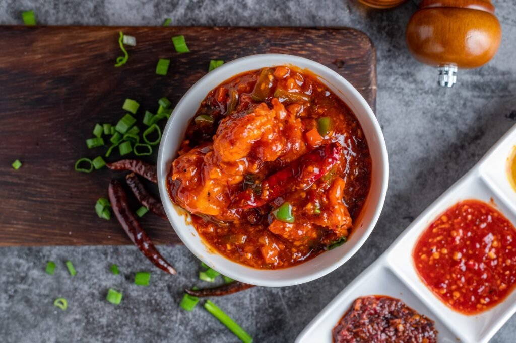 white ceramic bowl with red sauce