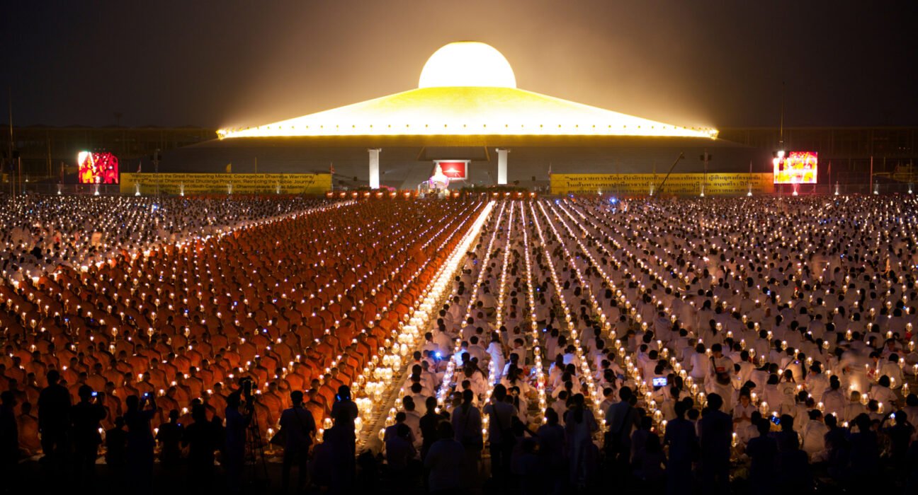 dhammakaya temple sets record with 330,000 candles tricycle