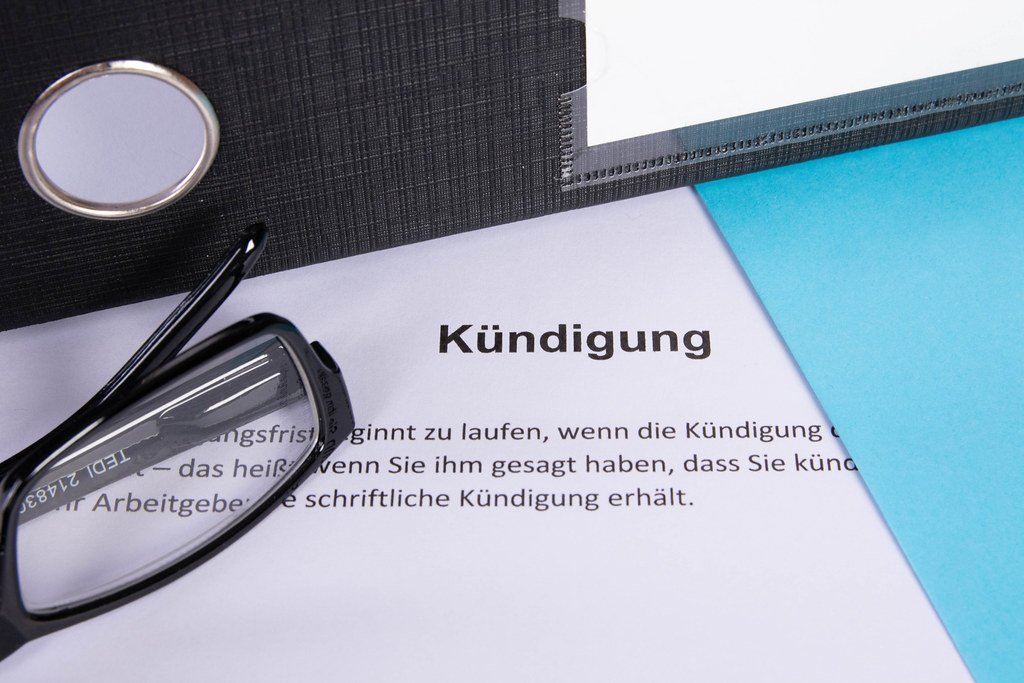 kündigung document with glasses and document folder | flickr