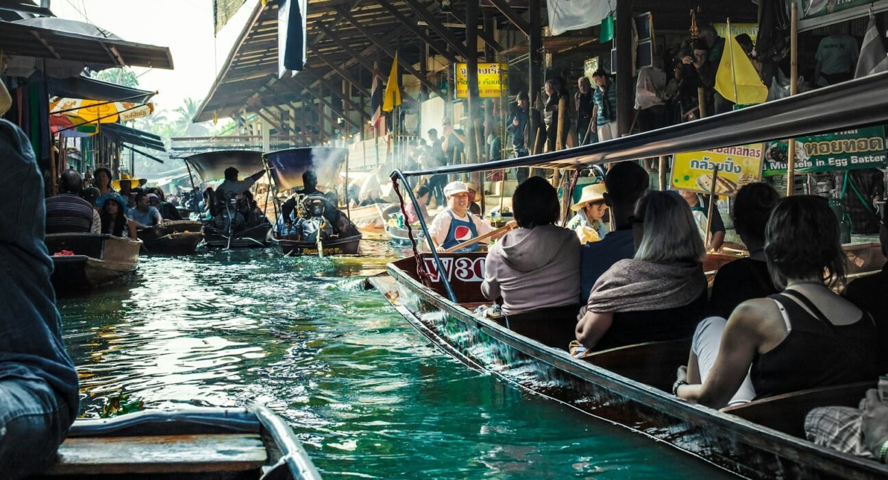 people riding on boat during daytime