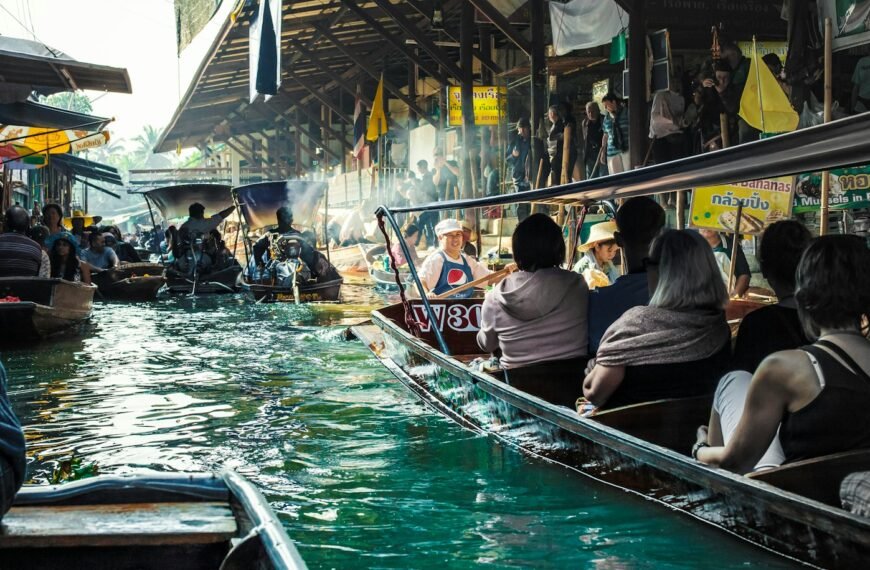 people riding on boat during daytime
