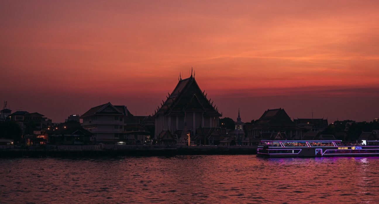 a boat floating on top of a body of water