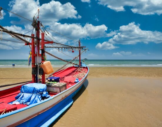 traditional fishing boat at a beach of thailand