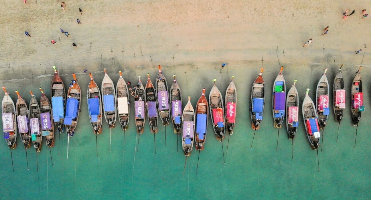 aerial view of boats on sea during daytime