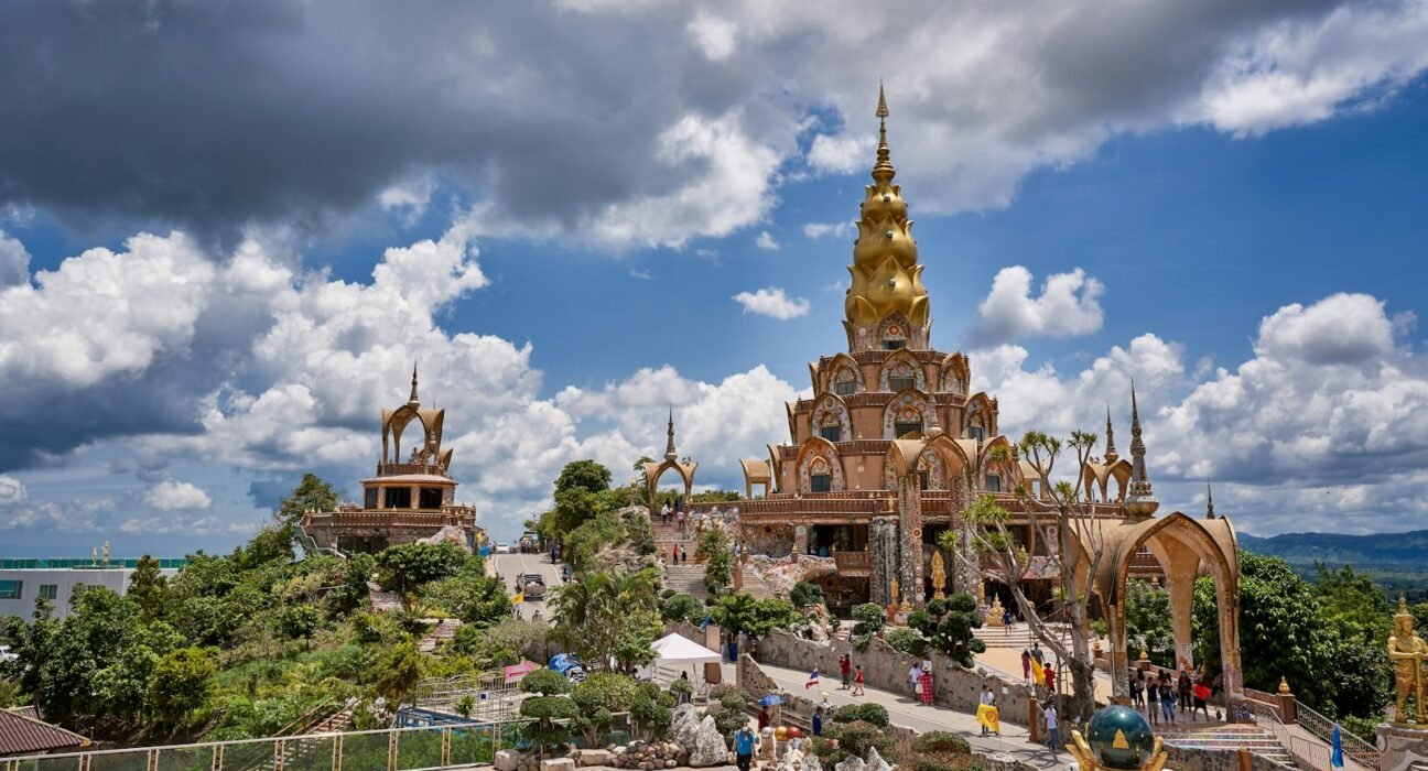a large building with a golden spire on top of it