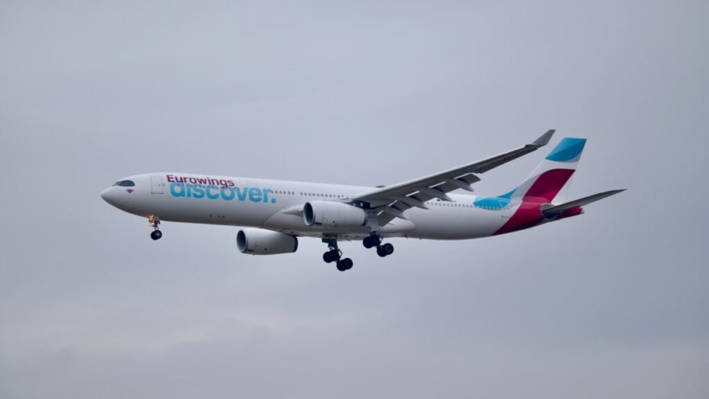 a large airplane flying in the sky