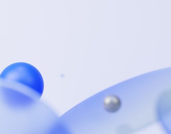 a close up of a blue object on a white surface