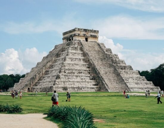 group of people standing ear gray temple