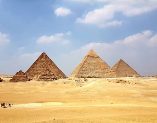 brown pyramid under blue sky during daytime